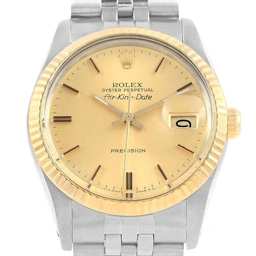 The image shows the front view of a Rolex Vintage Collection 5701 Men's Steel and Gold (two tone) Champagne Dial 5701 Men's Steel and Gold (two tone) Champagne Dial Air-King-Date, highlighting the dial, bezel, and part of the bracelet.