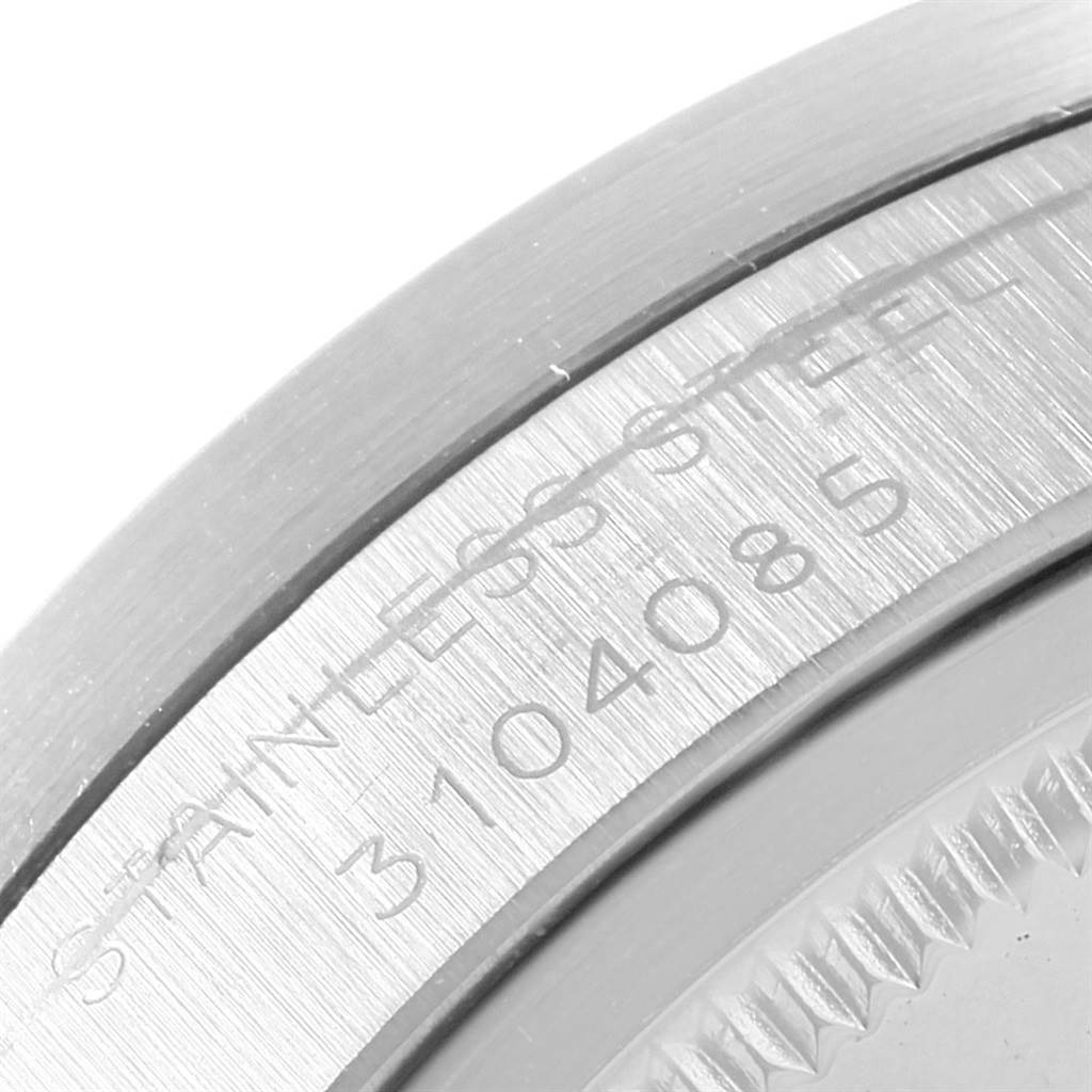 This close-up image of the Rolex Vintage Collection 1501 Stainless Steel Silver Dial 1501 Stainless Steel Silver Dial model shows the engraved stainless steel caseback details.