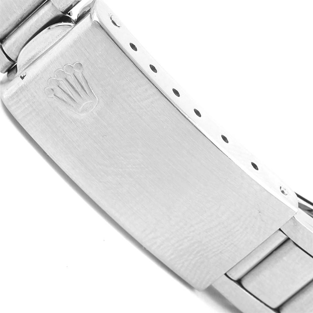 The image shows the clasp of the Vintage Collection watch by Rolex, with the Rolex logo engraved on it.