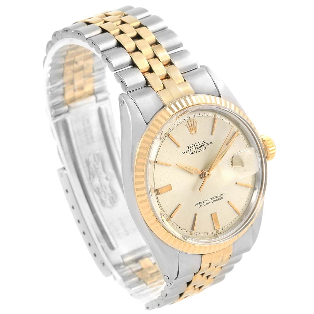 The Rolex Vintage Collection 1601 Men's Steel and Gold (two tone) Silver Dial 1601 Men's Steel and Gold (two tone) Silver Dial watch is shown at an angle, displaying its face, bezel, and two-tone bracelet.