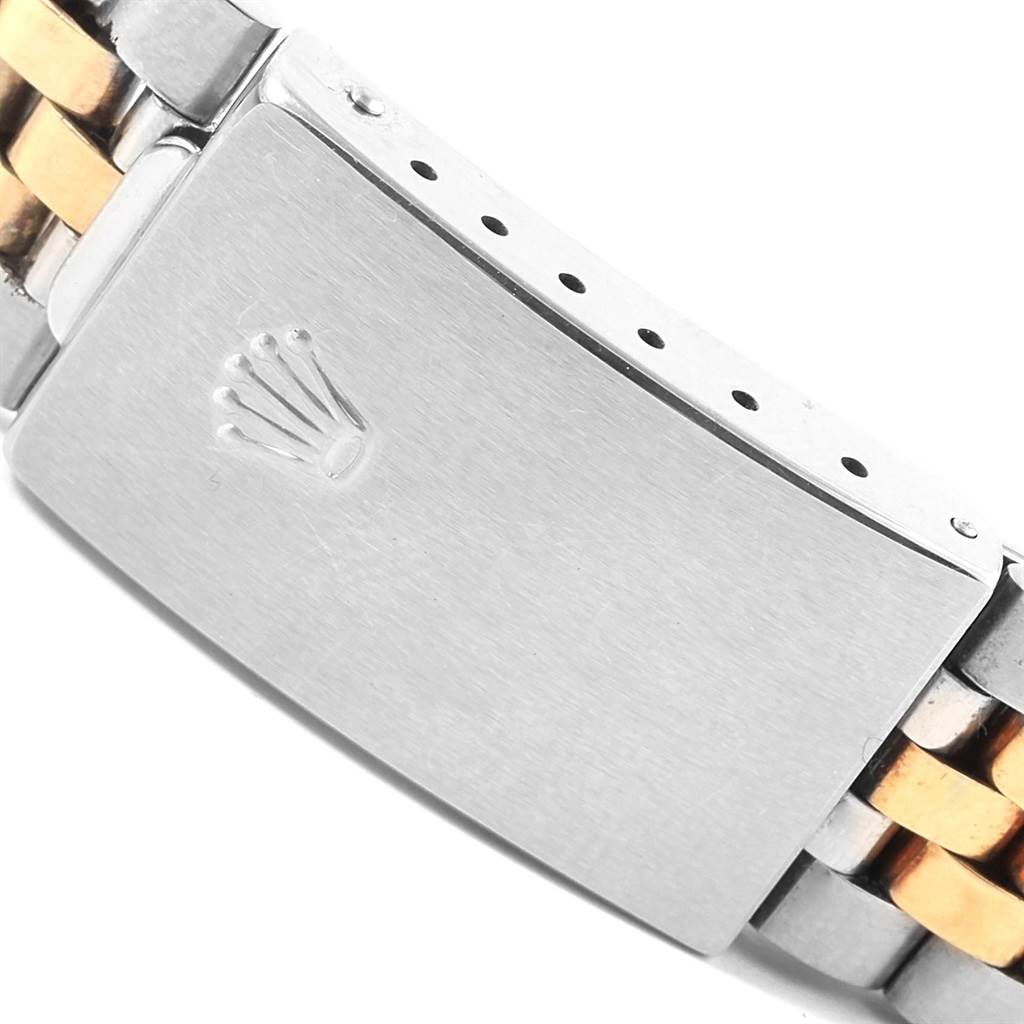 This image shows the clasp and part of the bracelet of a Rolex Vintage Collection 1601 Men's Steel and Gold (two tone) Silver Dial 1601 Men's Steel and Gold (two tone) Silver Dial watch.