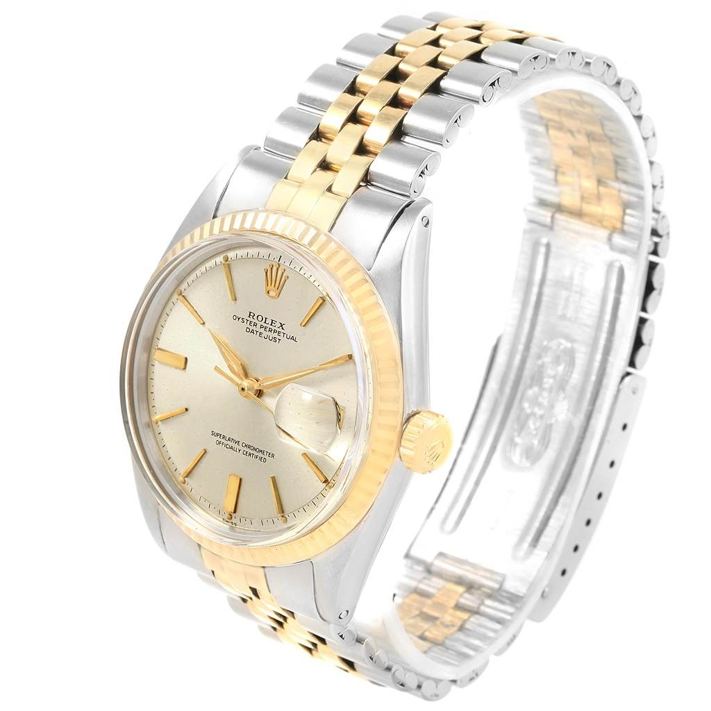 The Rolex Vintage Collection 1601 Men's Steel and Gold (two tone) Silver Dial 1601 Men's Steel and Gold (two tone) Silver Dial watch is shown at a three-quarter angle, displaying its dial, bezel, crown, and two-tone bracelet.
