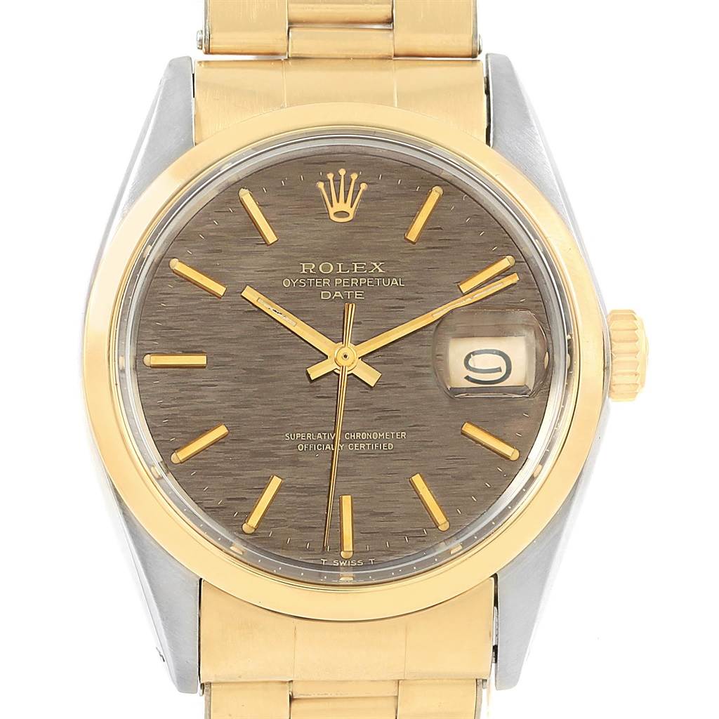 The image shows a front view of the Rolex Vintage Collection 1500 Men's Stainless Steel Brown Dial 1500 Men's Stainless Steel Brown Dial Oyster Perpetual Date watch, showcasing its dial, hands, and bracelet.
