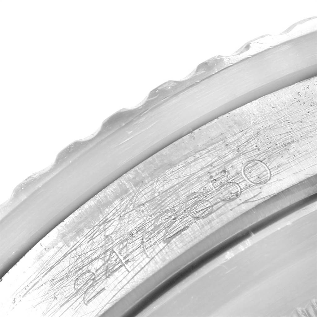 This close-up image shows part of the case back rim with engraved numbers on a Rolex Vintage Collection 5513 Men
s Stainless Steel Black Dial 5513 Men
s Stainless Steel Black Dial watch.