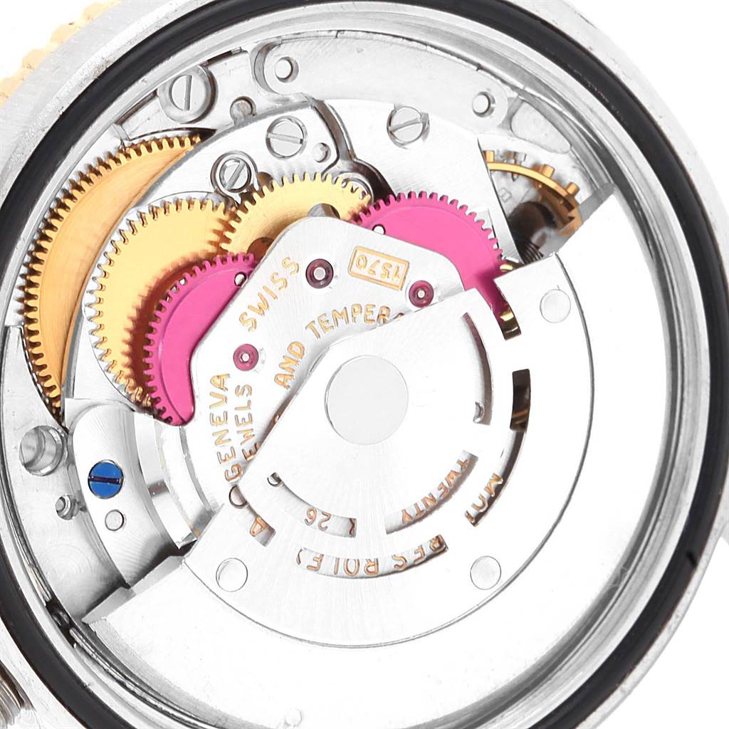 The image shows the intricate internal mechanical parts of a Vintage Collection model by Rolex, viewed from the back.