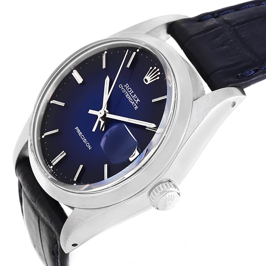 The image shows a side view of the Rolex Vintage Collection 6694 Men's Stainless Steel Blue Dial 6694 Men's Stainless Steel Blue Dial model watch, highlighting the dial, crown, and strap.