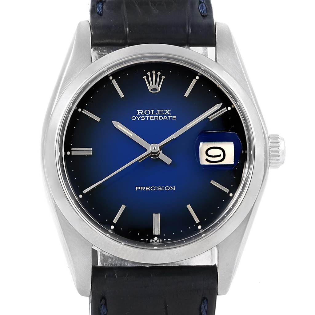 The image shows the front view of a Vintage Collection Rolex Oysterdate watch, highlighting its blue dial, date window, and crown.