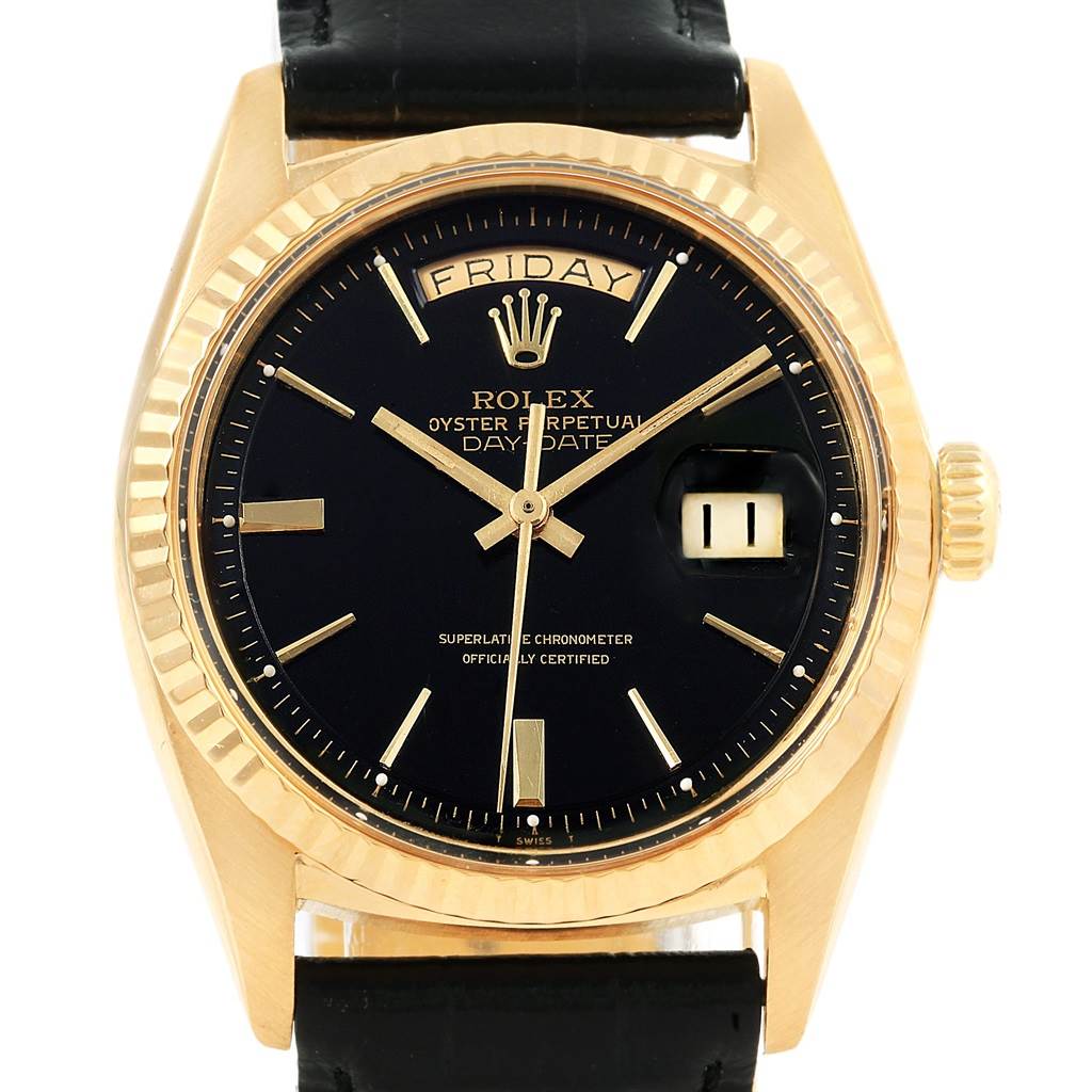 The image shows a frontal view of the Rolex Vintage Collection 1803 Men's Yellow Gold Black Dial 1803 Men's Yellow Gold Black Dial Oyster Perpetual Day-Date watch with a black dial and a gold case.