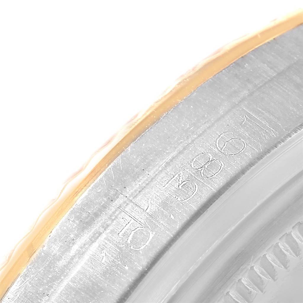 The image shows a close-up of the serial number engraved on the metal case of a Rolex Vintage Collection 1603 Men's Steel and Gold (two tone) Champagne Dial 1603 Men's Steel and Gold (two tone) Champagne Dial watch.