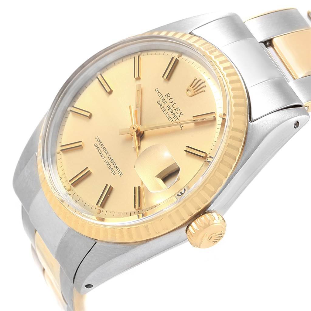 This image shows a close-up angle of the Rolex Vintage Collection 1603 Men's Steel and Gold (two tone) Champagne Dial 1603 Men's Steel and Gold (two tone) Champagne Dial watch, highlighting its dial, bezel, crown, and part of the bracelet.