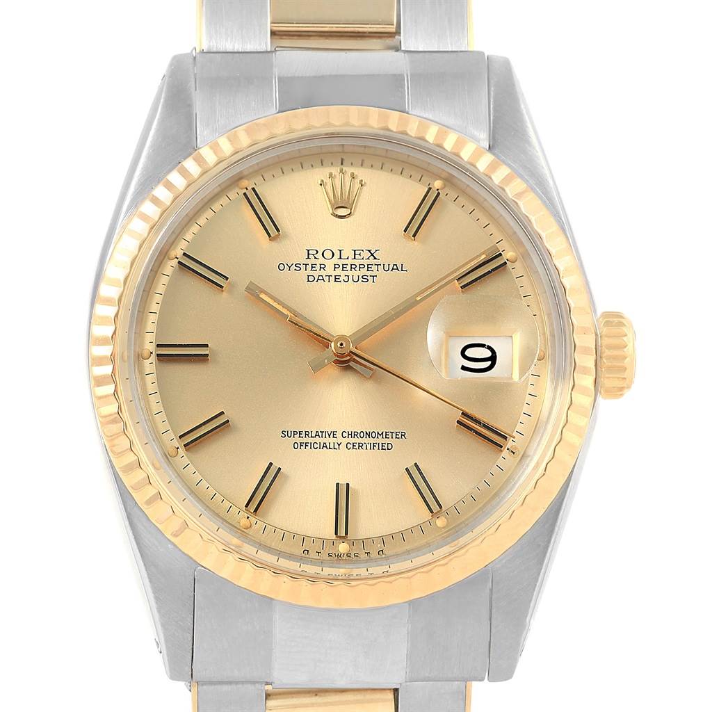 The Rolex Vintage Collection 1603 Men's Steel and Gold (two tone) Champagne Dial 1603 Men's Steel and Gold (two tone) Champagne Dial model is shown from the front, highlighting its gold dial, fluted bezel, and date window.