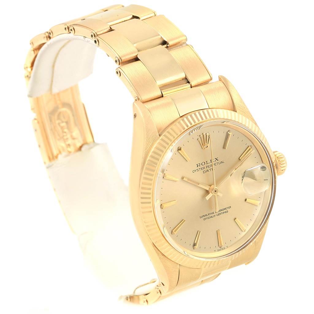 The image shows a Rolex Vintage Collection 1503 Men's Yellow Gold Champagne Dial 1503 Men's Yellow Gold Champagne Dial watch at an angle displaying the face, band, and some of the clasp.