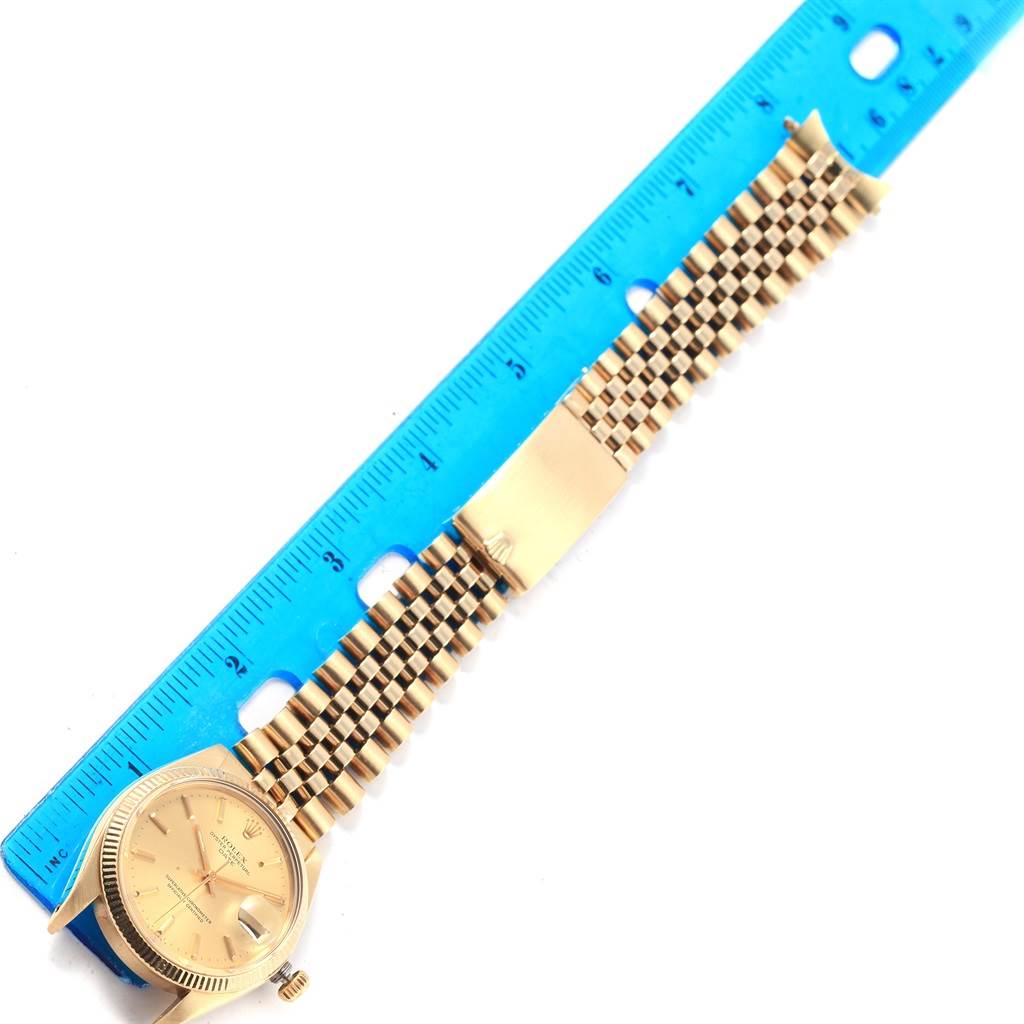 The image shows the Rolex Vintage Collection 1503 Men's Yellow Gold Champagne Dial 1503 Men's Yellow Gold Champagne Dial model watch laid flat with its face, bezel, and bracelet visible.