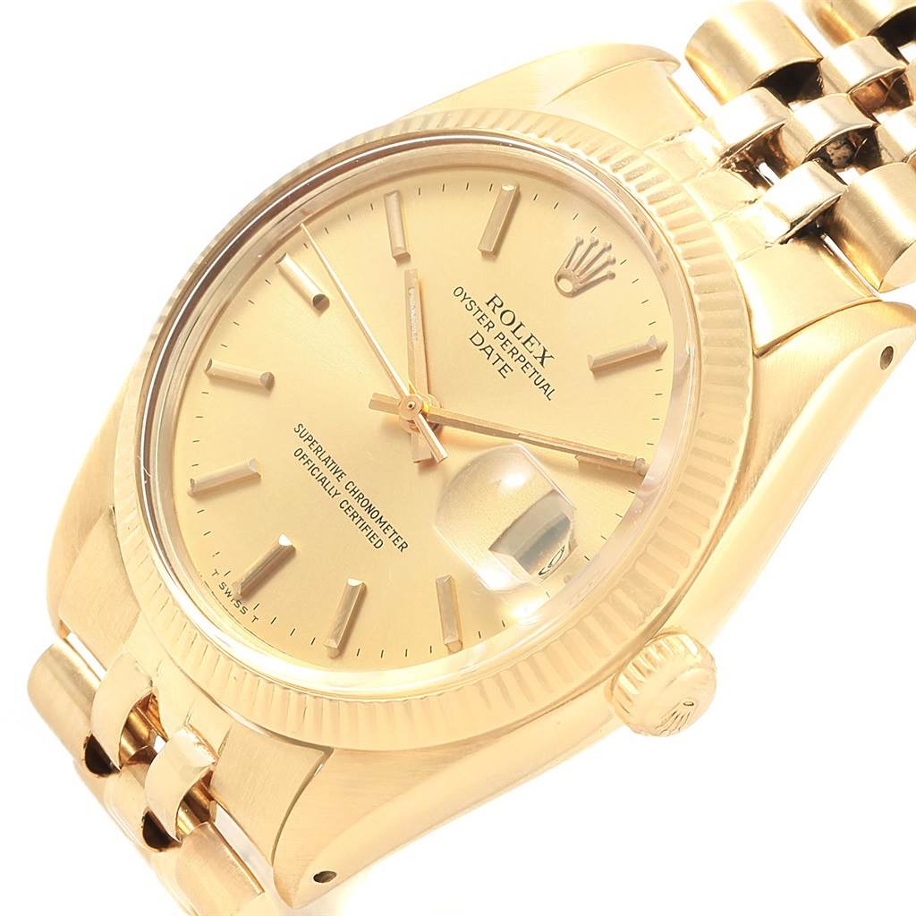 The image shows a close-up of the face, bezel, crown, and partial bracelet of the Vintage Collection Rolex Oyster Perpetual Date watch.