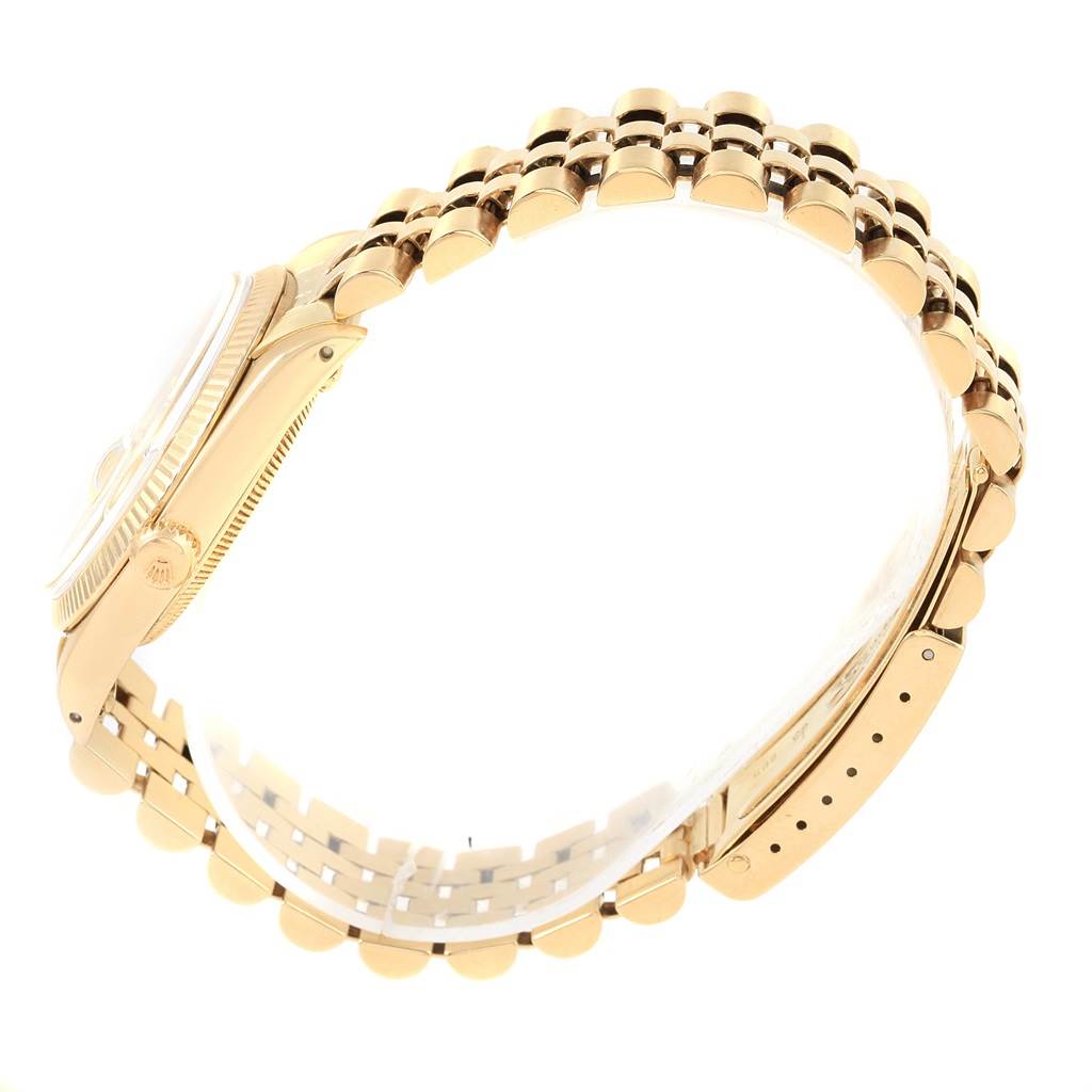 This image shows a side view of the Rolex Vintage Collection 1503 Men's Yellow Gold Champagne Dial 1503 Men's Yellow Gold Champagne Dial watch, highlighting the case, bezel, crown, and bracelet.