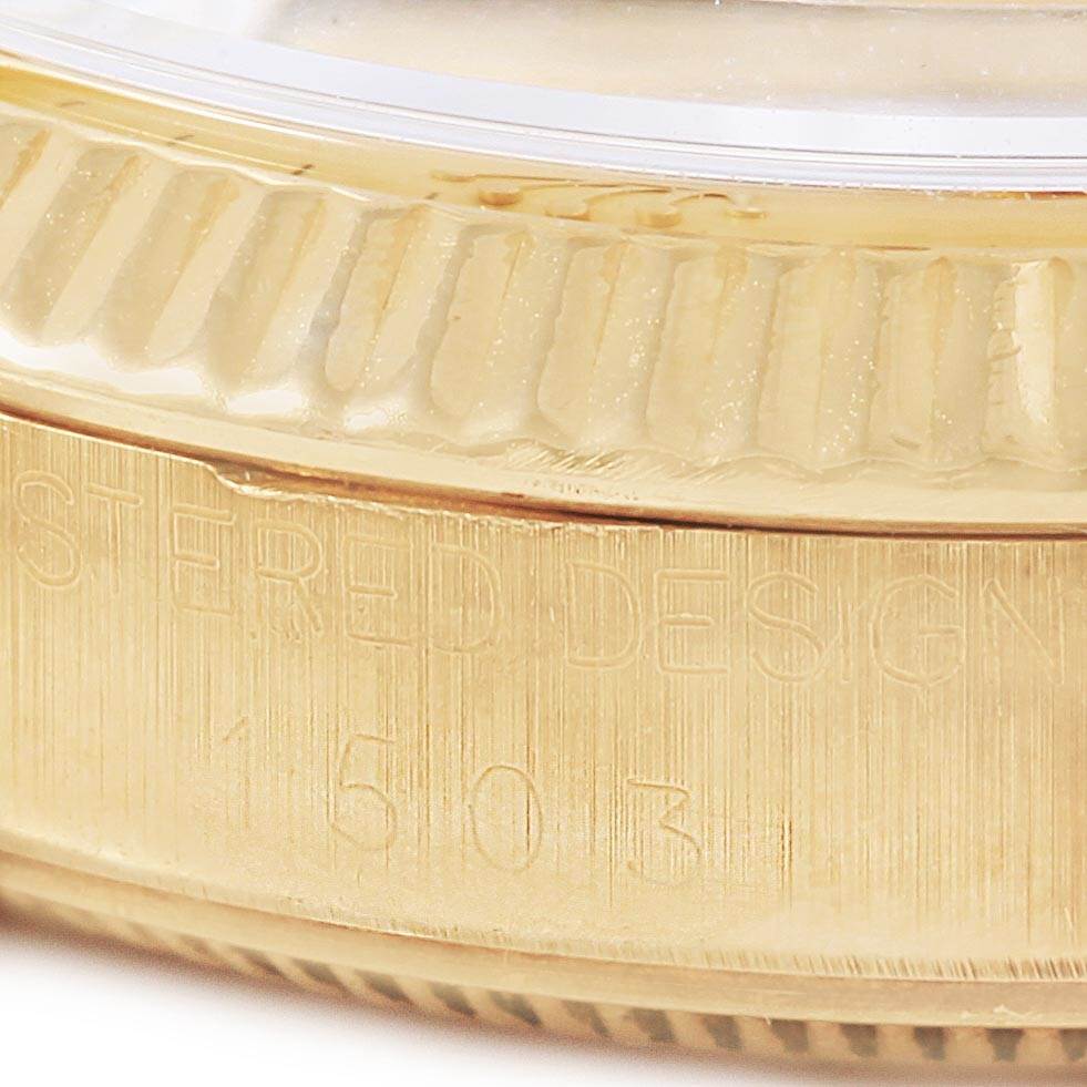 This close-up photo shows the side of the bezel and the case edge with engravings of the Rolex Vintage Collection 1503 Men's Yellow Gold Champagne Dial 1503 Men's Yellow Gold Champagne Dial watch model.