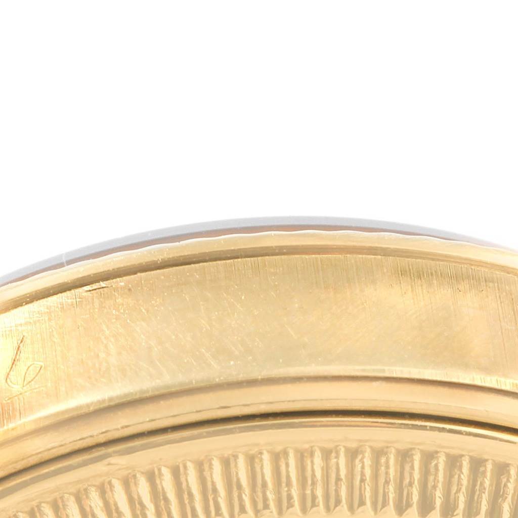 This image shows a close-up of the bezel and case side of a Rolex Vintage Collection 1503 Men's Yellow Gold Champagne Dial 1503 Men's Yellow Gold Champagne Dial watch.