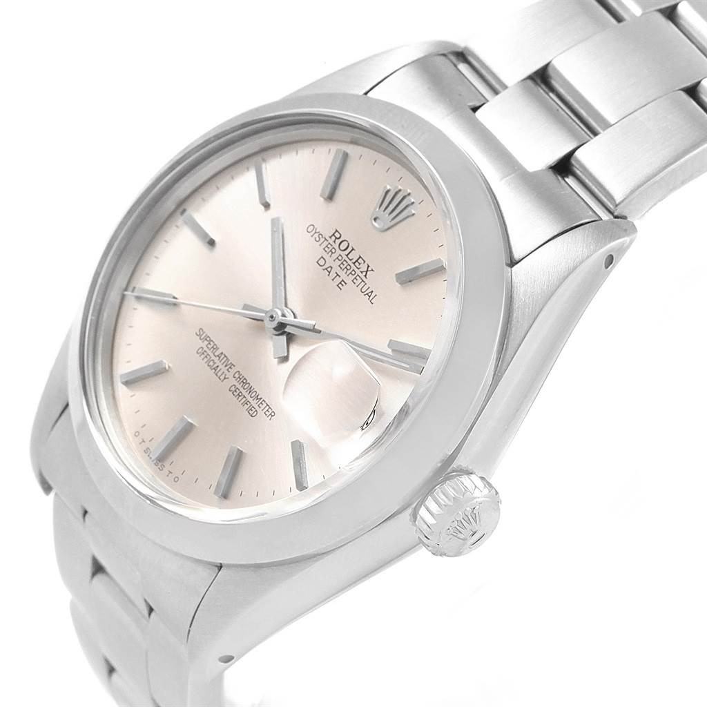 The image shows a close-up of the Rolex Vintage Collection 1501 Men's Stainless Steel Silver Dial 1501 Men's Stainless Steel Silver Dial model, highlighting the dial, crown, and part of the bracelet from an oblique angle.