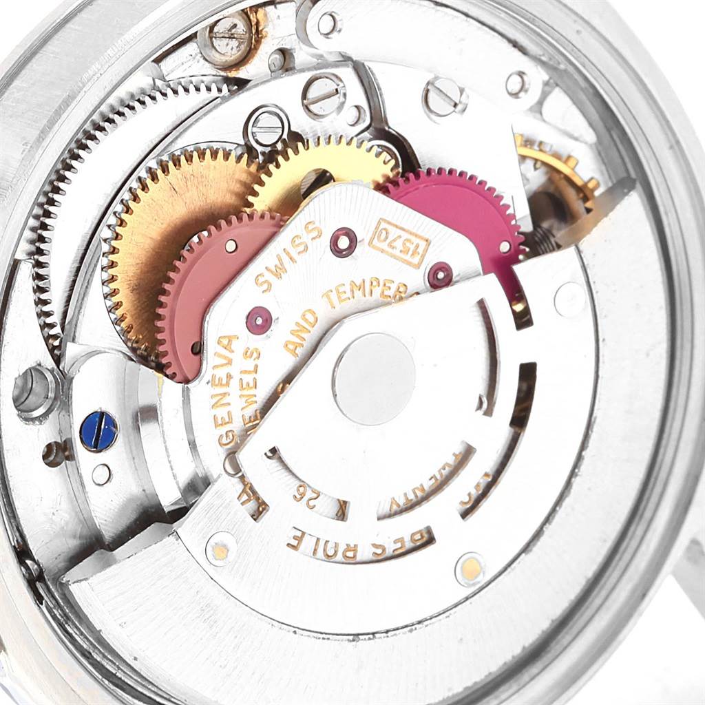 The image shows a close-up of the internal mechanism of a Rolex Vintage Collection 1501 Men's Stainless Steel Silver Dial 1501 Men's Stainless Steel Silver Dial watch.