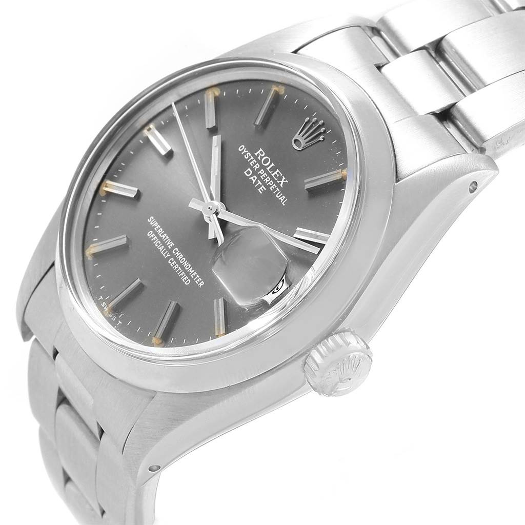 The image shows the face, crown, and part of the bracelet of a Rolex Vintage Collection 1500 Men's Stainless Steel Grey Dial 1500 Men's Stainless Steel Grey Dial Oyster Perpetual Date watch, angled from the top-right.
