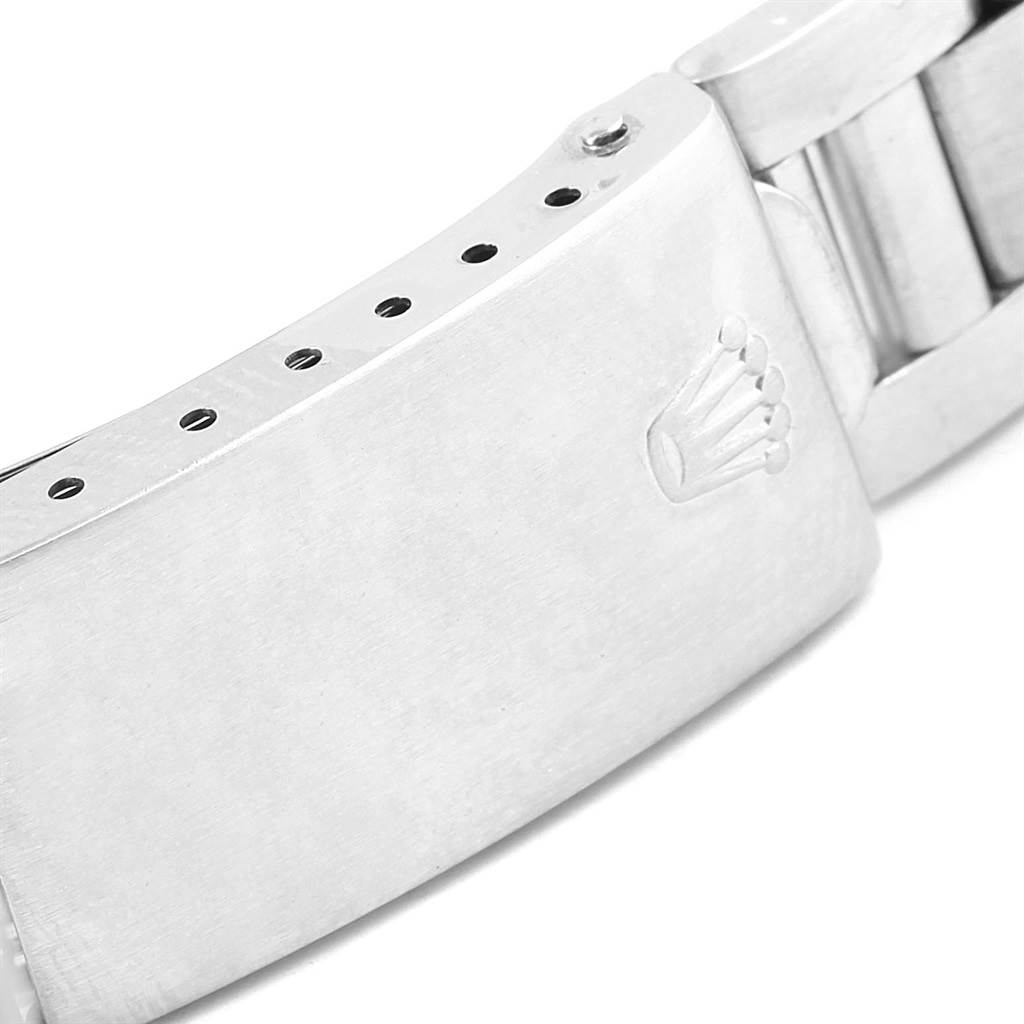 This image shows the clasp of a Rolex Vintage Collection 1500 Men's Stainless Steel Grey Dial 1500 Men's Stainless Steel Grey Dial watch, featuring the Rolex logo.