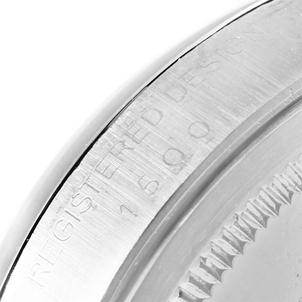 The image shows a close-up view of the case back edge and engraved text on a Rolex Vintage Collection 1500 Men's Stainless Steel Grey Dial 1500 Men's Stainless Steel Grey Dial model watch.