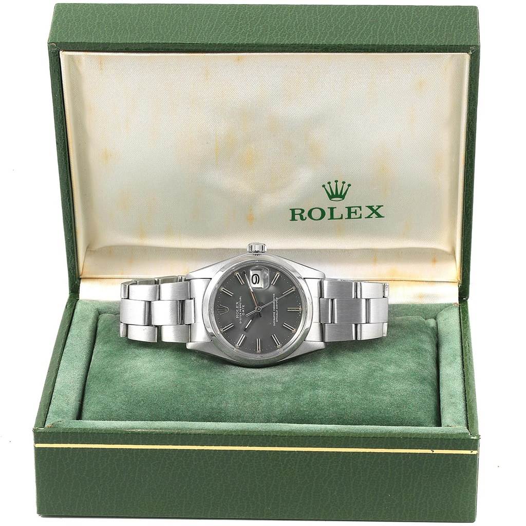 The Vintage Collection Rolex watch is shown from the front in its green box with the Rolex logo.