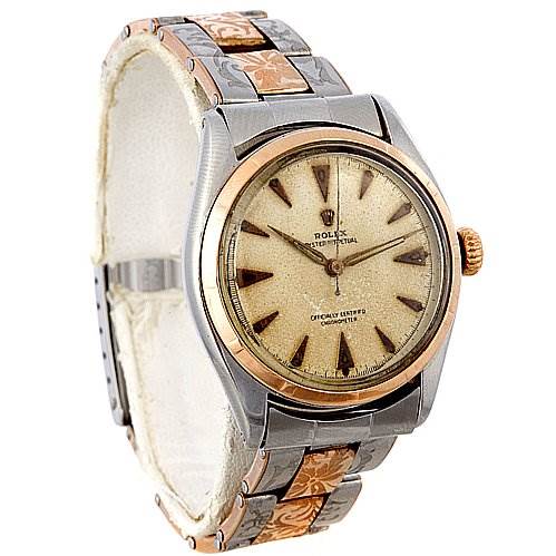 The image shows a Rolex Vintage Collection 6085 Rose Gold Silver Dial 6085 Rose Gold Silver Dial watch from a frontal angle featuring the dial, bezel, case, and part of the strap.