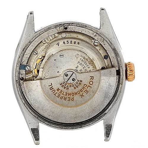 The image shows the back view of a Rolex Vintage Collection 6085 Rose Gold Silver Dial 6085 Rose Gold Silver Dial watch, specifically displaying its internal mechanical movement.