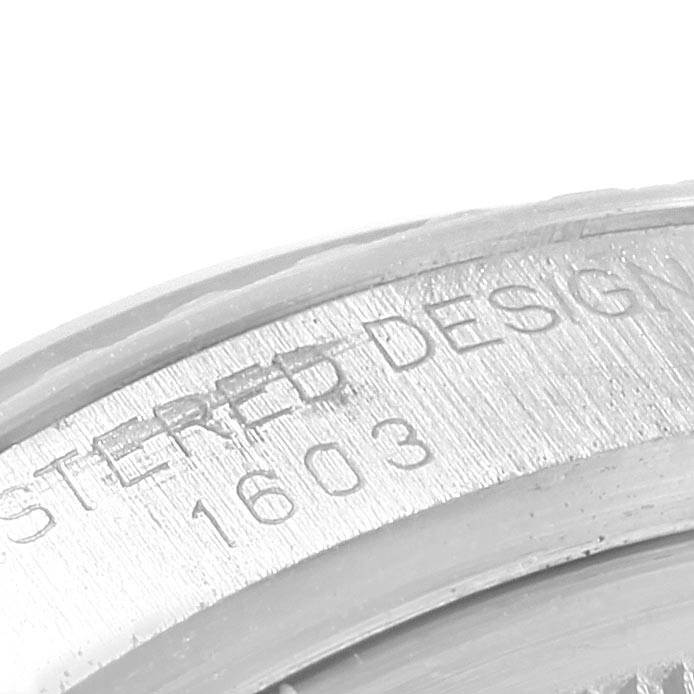 The image shows the inner rim part of the Vintage Collection model by Rolex, featuring the engraved text "REGISTERED DESG 1603."