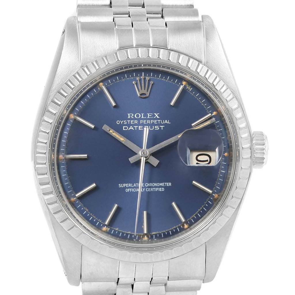 The image shows a front view of a Vintage Collection Rolex Oyster Perpetual Datejust watch with a blue dial and stainless steel bracelet.