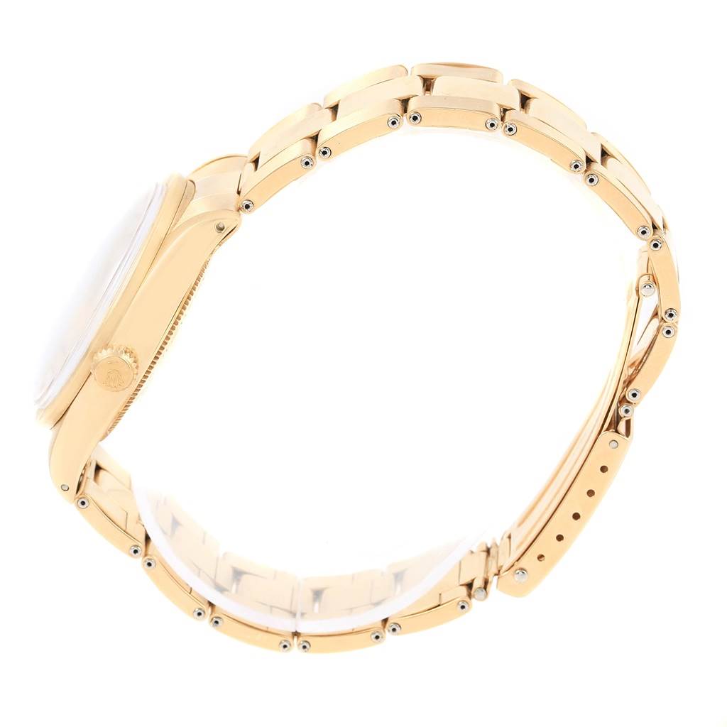 The image shows a side view of the Vintage Collection watch by Rolex, highlighting the case, crown, and bracelet.