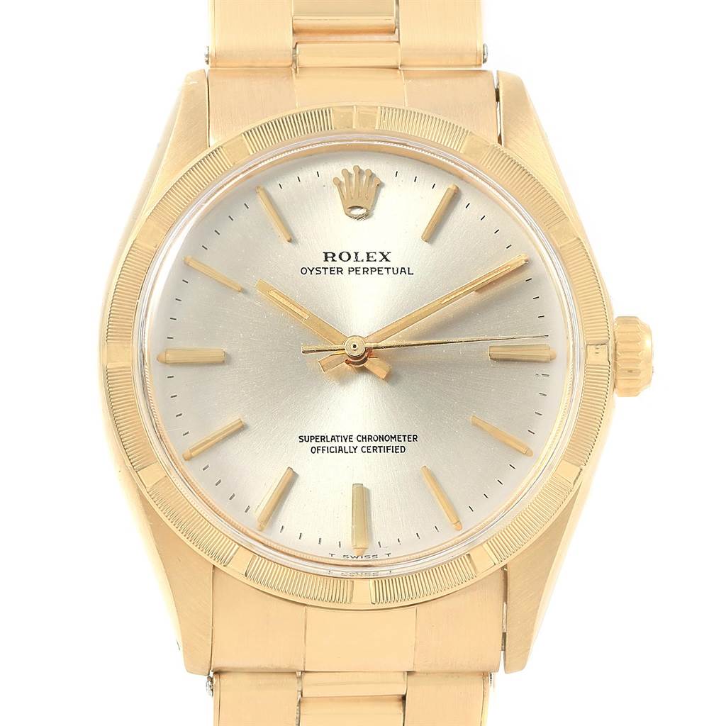The image shows a front view of the Rolex Oyster Perpetual Vintage Collection watch, featuring its dial, hands, and part of the bracelet.