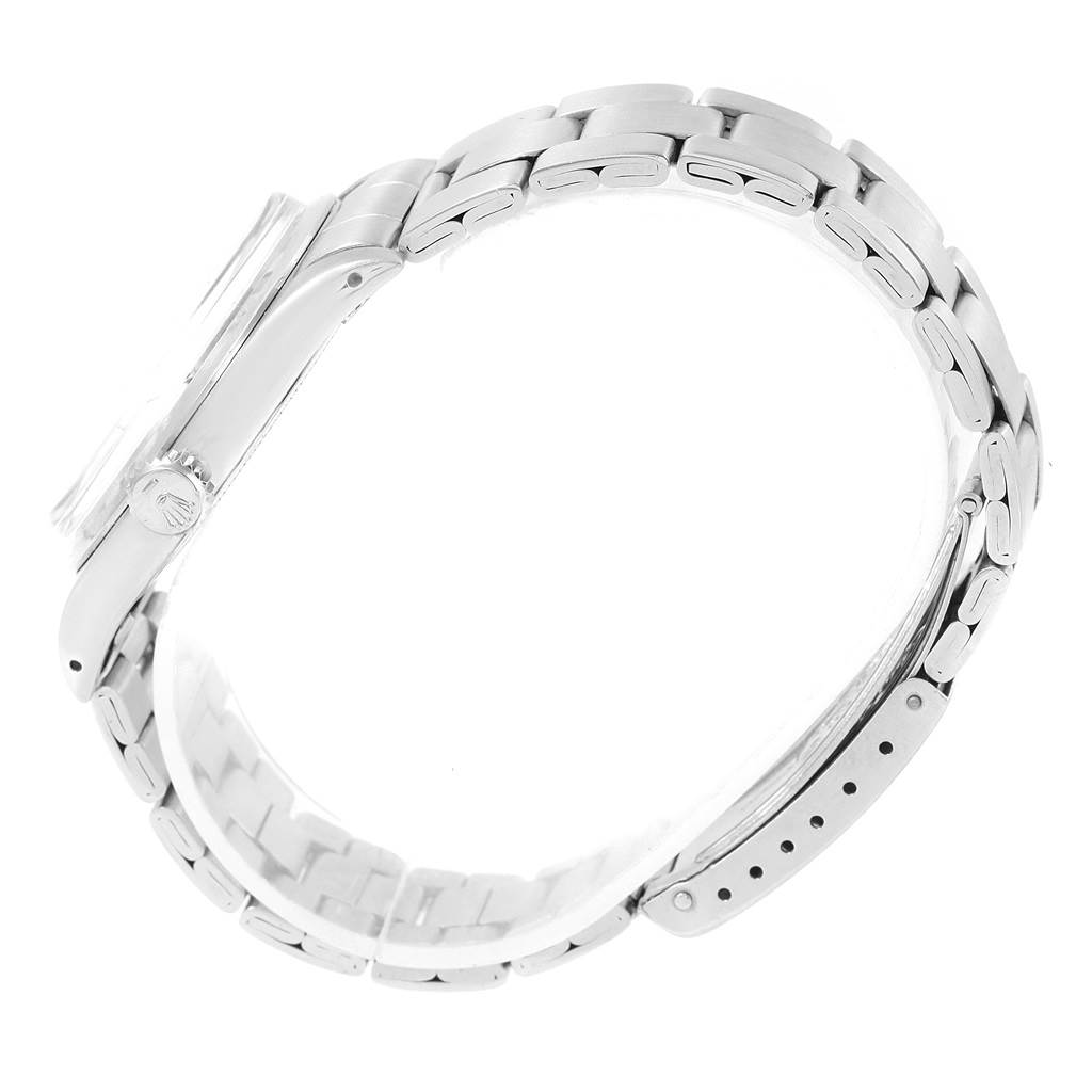 The image shows a side angle of the Rolex Vintage Collection 6422 Men's Stainless Steel Silver Dial 6422 Men's Stainless Steel Silver Dial watch, displaying its crown, case, and stainless steel bracelet.