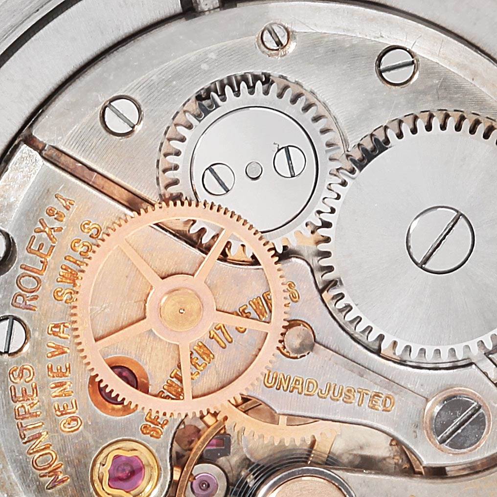 This image shows the intricate inner mechanical gears and components of the Rolex Vintage Collection 6422 Men's Stainless Steel Silver Dial 6422 Men's Stainless Steel Silver Dial watch at a close-up angle.
