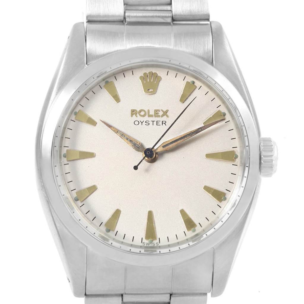 The image shows a frontal view of the Rolex Vintage Collection 6422 Men's Stainless Steel Silver Dial 6422 Men's Stainless Steel Silver Dial Oyster watch, highlighting its face, hands, and bracelet.