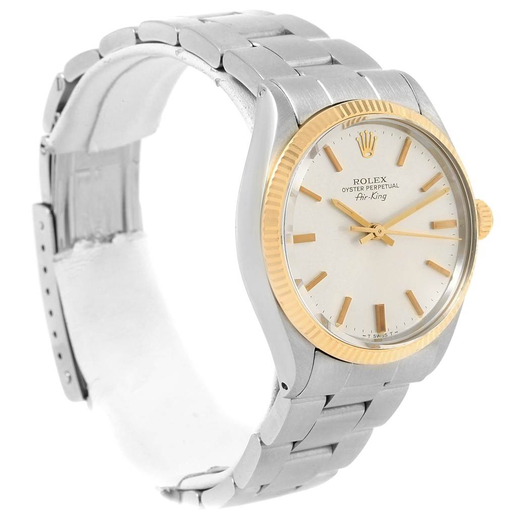 The image shows a side-angle view of the Rolex Vintage Collection 5501 Men's Steel and Gold (two tone) Silver Dial 5501 Men's Steel and Gold (two tone) Silver Dial Oyster Perpetual Air-King, displaying the dial, bezel, bracelet, and clasp.
