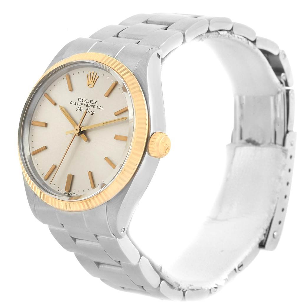 The image shows a side angle of the Rolex Vintage Collection 5501 Men's Steel and Gold (two tone) Silver Dial 5501 Men's Steel and Gold (two tone) Silver Dial Oyster Perpetual Air-King, highlighting the face, bezel, crown, and bracelet.