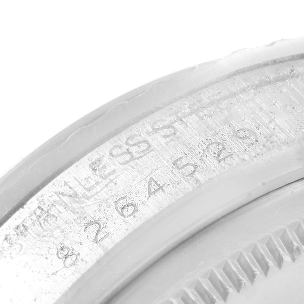 This image shows a close-up of the case back edge and engravings on a Rolex Vintage Collection 16030 Men's Stainless Steel Silver Dial 16030 Men's Stainless Steel Silver Dial watch.