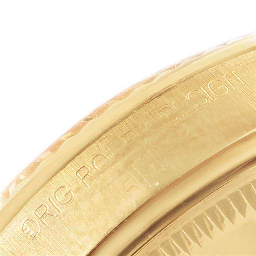 The image shows a close-up of the side engraving on the Rolex Vintage Collection 15037 Men's Yellow Gold Champagne Dial 15037 Men's Yellow Gold Champagne Dial watch case.