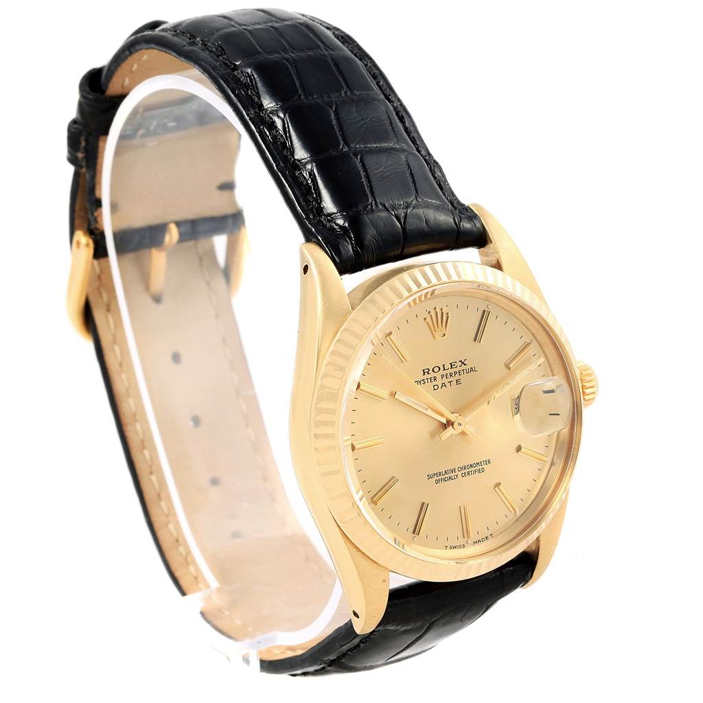 The image shows a Rolex Vintage Collection 15037 Men's Yellow Gold Champagne Dial 15037 Men's Yellow Gold Champagne Dial watch angled to display the face, bezel, and black leather strap.