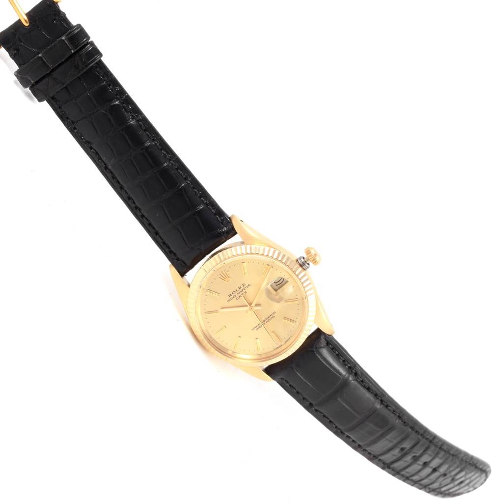 The image shows a Rolex Vintage Collection 15037 Men's Yellow Gold Champagne Dial 15037 Men's Yellow Gold Champagne Dial watch at a slight angle, displaying the gold face, bezel, crown, and black leather strap.