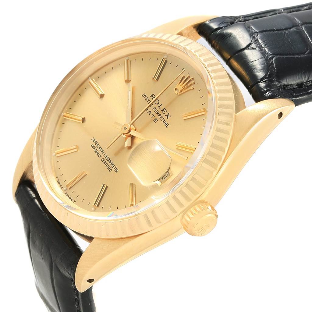 The image shows a close-up angled view of a Rolex Vintage Collection 15037 Men's Yellow Gold Champagne Dial 15037 Men's Yellow Gold Champagne Dial watch, highlighting its gold face, bezel, and black leather strap.