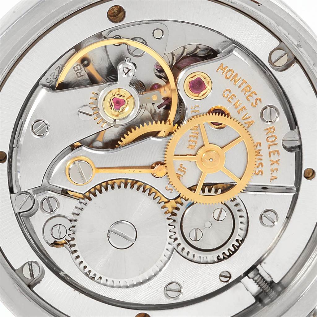 The image shows a close-up of the internal mechanism and gears of the Vintage Collection model by Rolex.