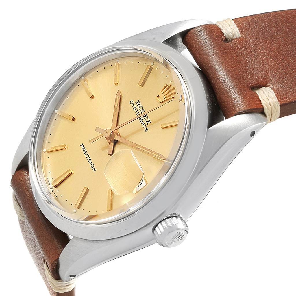 The image shows a close-up side angle of a Rolex Vintage Collection 6694 Men's Champagne Dial 6694 Men's Champagne Dial watch, displaying its face, crown, bezel, and part of the leather strap.