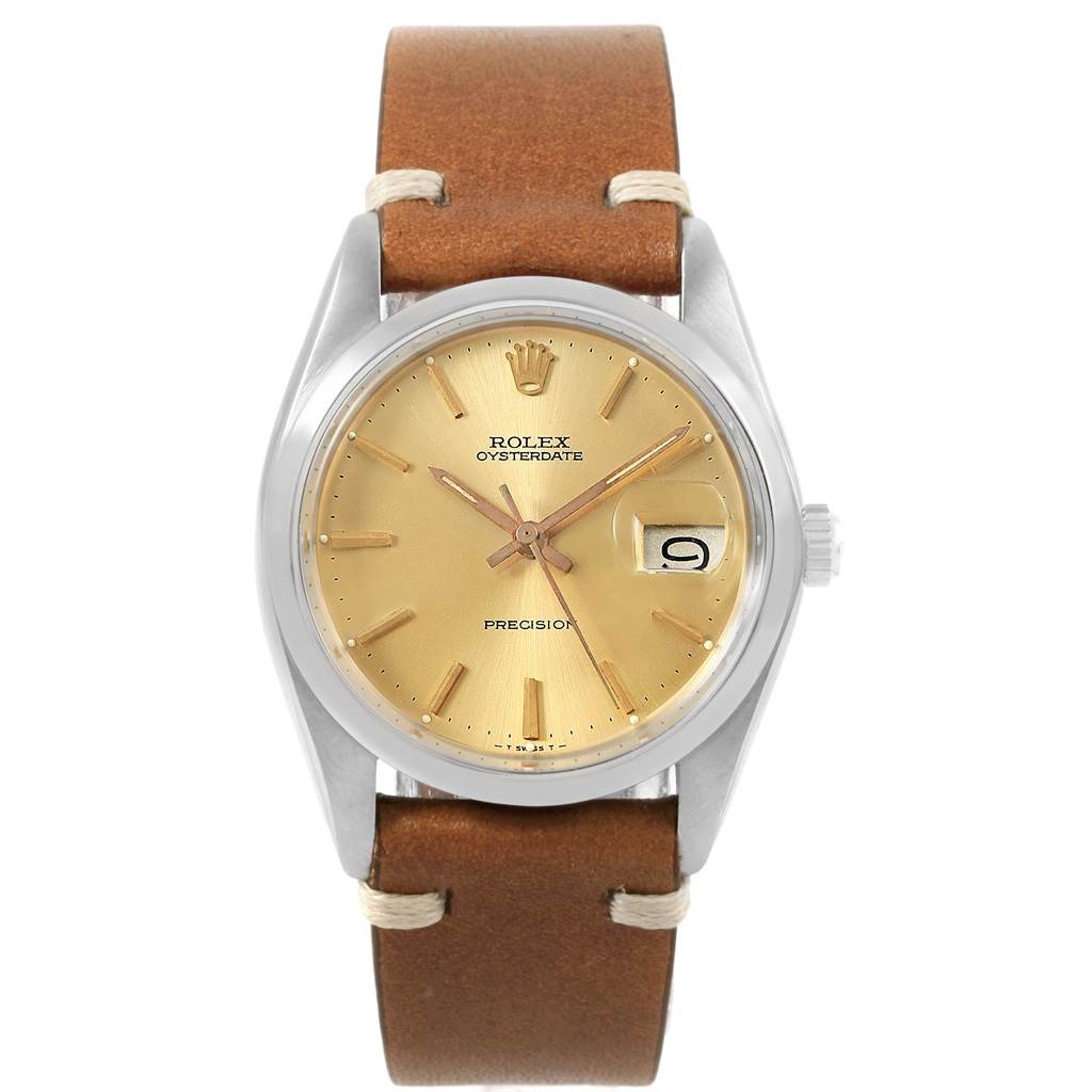 This Rolex Vintage Collection 6694 Men's Champagne Dial 6694 Men's Champagne Dial model watch is shown from the front, displaying its dial, hands, date window, and leather strap.