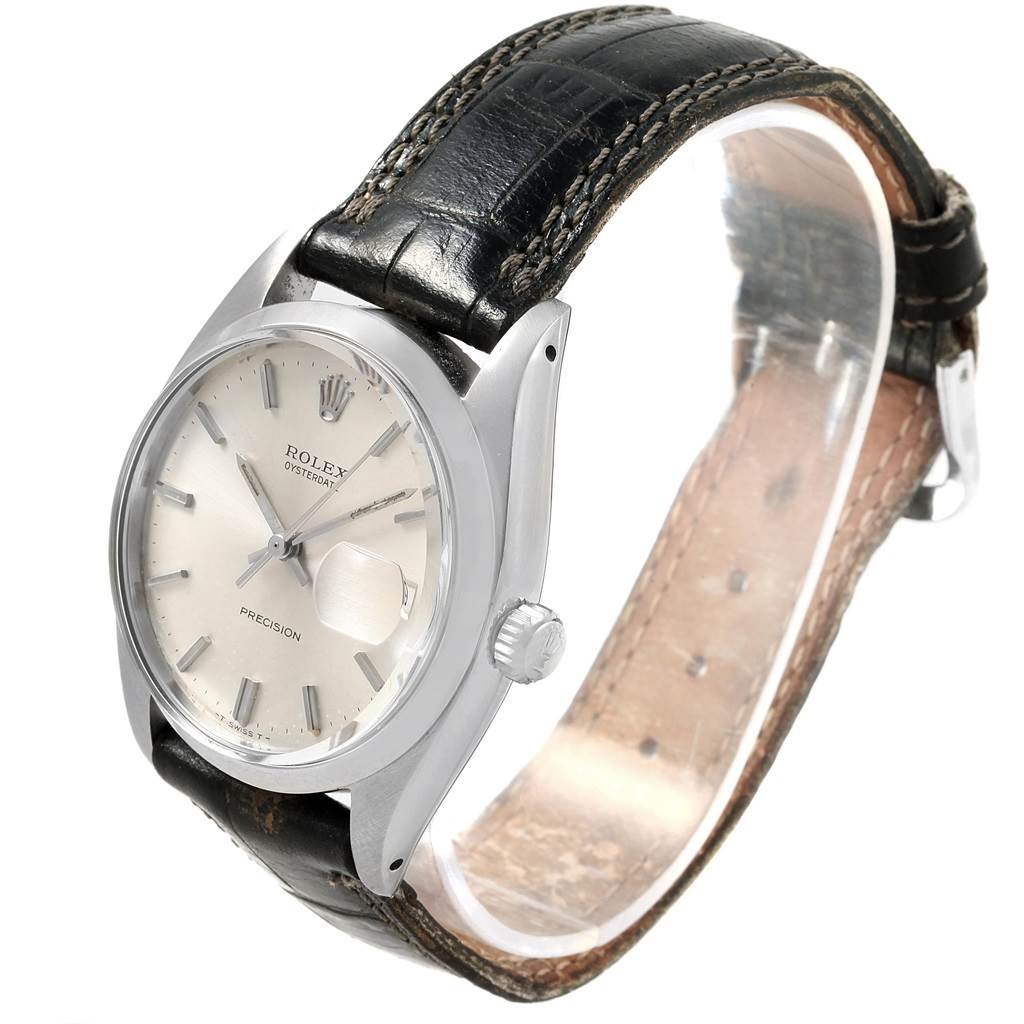 The image shows a Rolex Vintage Collection 6694 Men's Stainless Steel Silver Dial 6694 Men's Stainless Steel Silver Dial watch at a 3/4 angle, displaying the face, crown, and leather wristband.