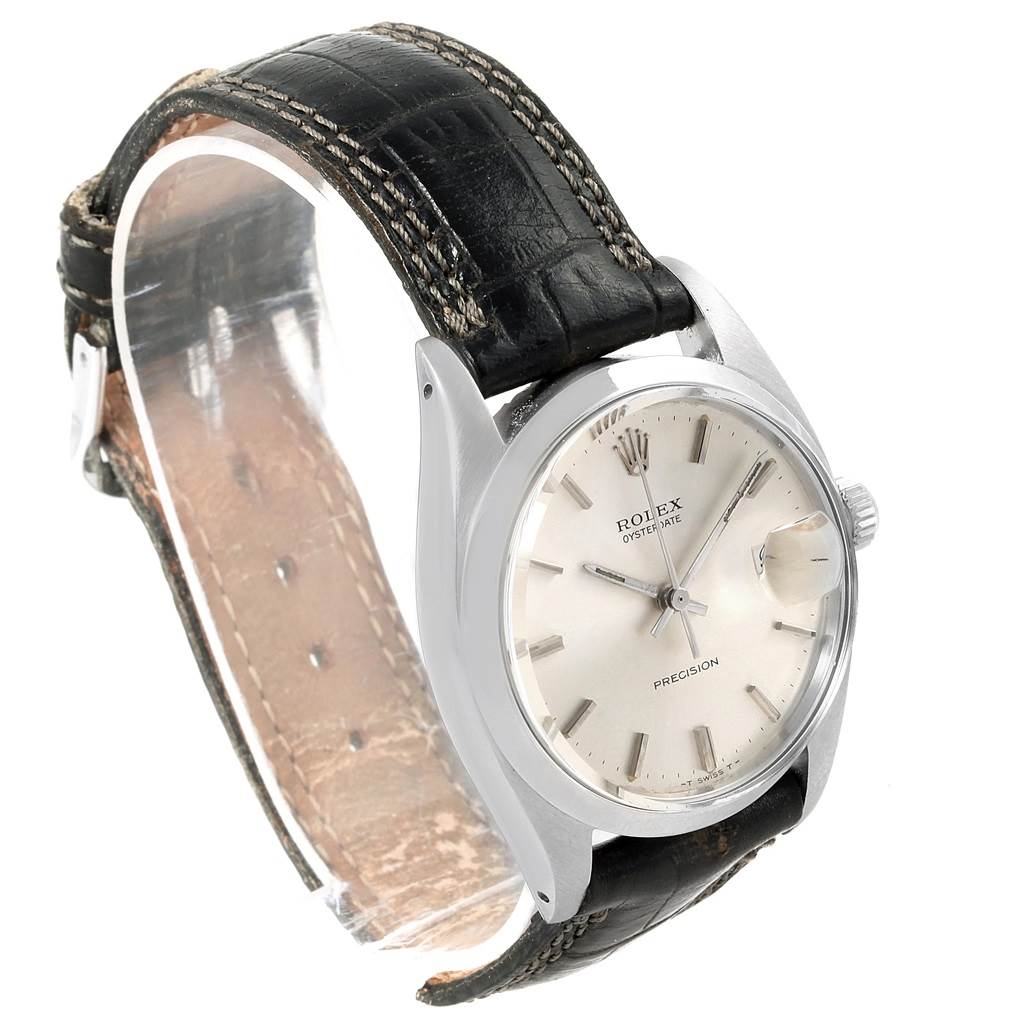 The image shows a Rolex Vintage Collection 6694 Men's Stainless Steel Silver Dial 6694 Men's Stainless Steel Silver Dial watch at a slight side angle, showcasing the dial, bezel, case, crown, and leather strap.