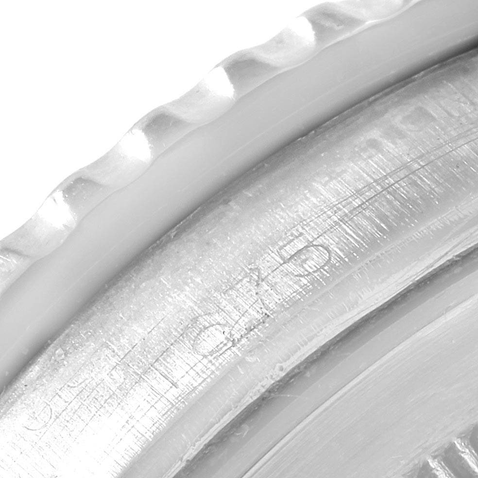 This close-up image shows the detailed engraving on the bezel of a Rolex Vintage Collection 1675 Men's Stainless Steel Black Dial 1675 Men's Stainless Steel Black Dial watch.