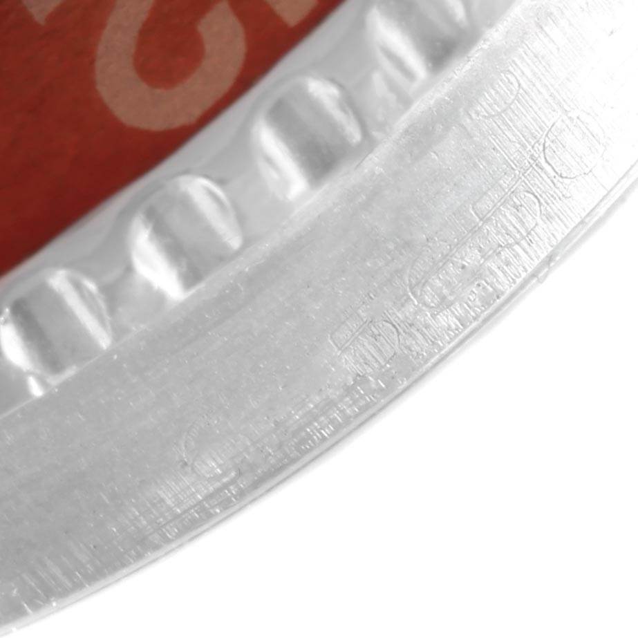 The image shows a close-up of the bezel of the Vintage Collection model by Rolex.